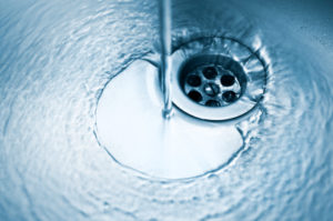 water going down drain in sink